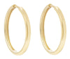 Yellow Gold Huggie Earrings.