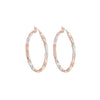 Rose Gold Twisted Hoop Earrings.