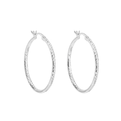 White Gold Diamond Cut Hoop Earrings.